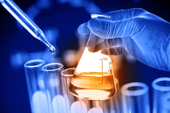 Laboratory bench - dropper into Erlenmeyer flask